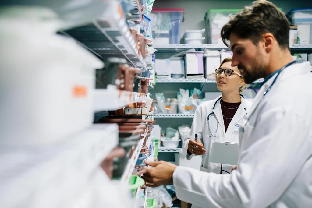 Medical professional preparing supplies